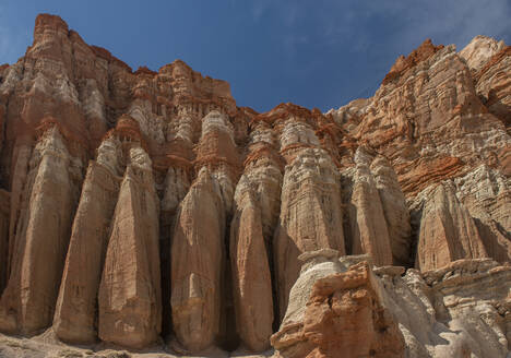 Red Rocks Towering Canyon Wall in Desert Landscape - CAVF83819