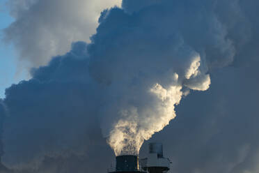 Smoke Stacks Pour Pollution Backlit by Sunrise - CAVF84159