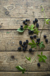 Fresh blackberries on wooden surface - ASF06623