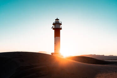 Far lighthouse water sky sunset - CAVF84256