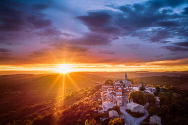 Aerial view of the Church of St. Rocco at sunset in Draguc, Croatia - AAEF08648