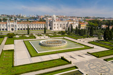 Aerial view of Jeronimos Monastery and Empire Square, on a partial sunny day, durind the pandemic Covid-19, in Lisbon, Portugal's capital. - AAEF08711