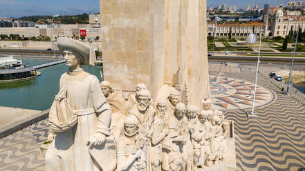 Aerial view of Monument to the Discoveries, on a partial sunny day, durind the pandemic Covid-19, in Lisbon, Portugal's capital. - AAEF08714