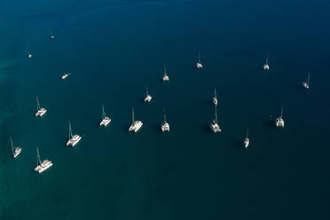 Aerial view of yachts in turquoise waters in Saronic Gulf, Greece - AAEF08863