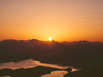 Idyllic view of silhouette landscape and lake against sky during sunset, Leon, Spain - FVSF00431