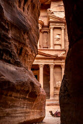 Low Angle View Of Historical Building Seen Through Rock Formations - EYF05084