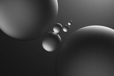 Glass spheres and dramatic lighting over dark grey background, 3D Illustration - DRBF00175