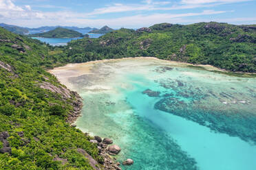 Aerial view of the Baie Ternay Marine National Park, looking towards Port Launay, Seychelles - AAEF08958