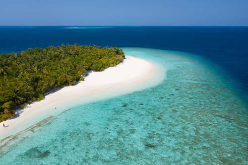 Aerial view of the shore of a beach on a small island in North Province, Maldives - AAEF08973