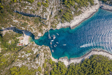 Aerial view of the shore of Stiniva beach on sunny day in Marinje Zemlje, Croatia - AAEF09064