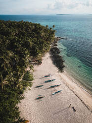 Aerial view of boats on the shore of the beach in General Luna, Surigao del Norte, Philippines - AAEF09098