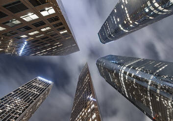 Looking up at skyscrapers in downtown Los Angeles at night - CAVF84782