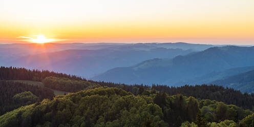 Germany, Baden-Wurttemberg, Sunrise over Black Forest range seen from Schauinsland mountain - WDF06022