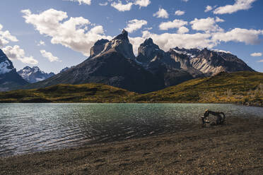 Chile, Lakeshore in Torres Del Paine National Park with Cuernos Del Paine in background - UUF20637