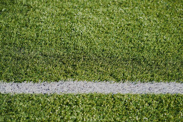 White line football corner on green field - CAVF85009