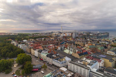 Sweden, Scania, Malmo, Aerial view of residential district with Turning Torso and Oresund in background - TAMF02257