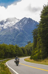 Man riding touring motorbike in the Rio Negro province of Argentina - CAVF85157