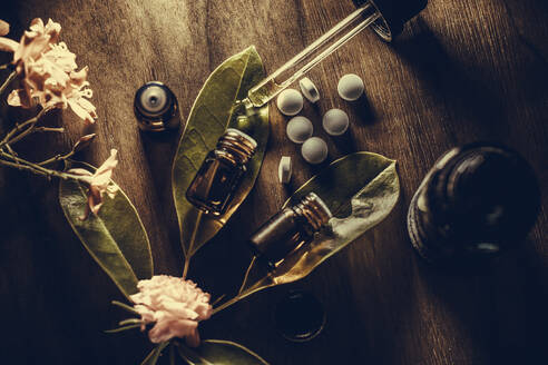 Close-Up Of Medicines And Herbs On Table - EYF05797