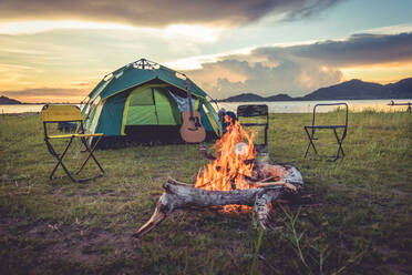 Campfire By Tent On Field - EYF05903