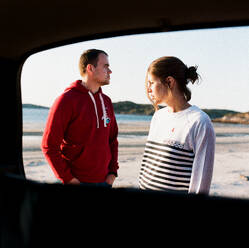 Man and woman stand on the seashore - CAVF85276