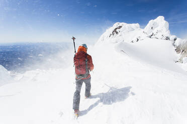 A man climbs down from the summit of Mt. Hood in Oregon. - CAVF85350