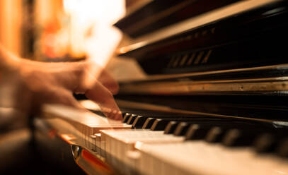 Cropped Hands Of Man Playing Piano - EYF05990