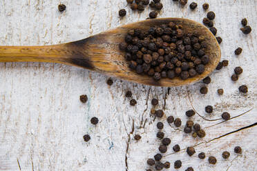 Close-Up Of Black Peppercorn On Table - EYF06020