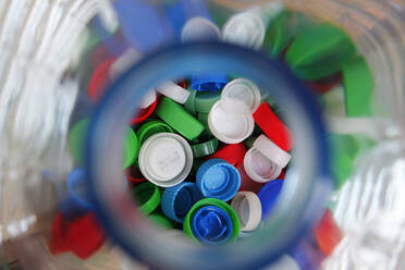 Directly Above Shot Of Multi Colored Bottle Caps - EYF06034