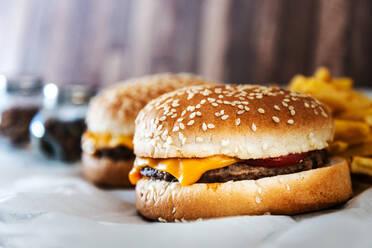 Close-Up Of Burgers On Table - EYF06046