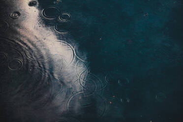 Full Frame Shot Of Raindrops Falling In Lake - EYF06257