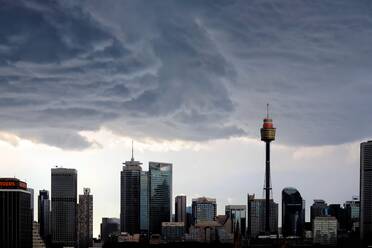 Buildings In City Against Cloudy Sky - EYF06480