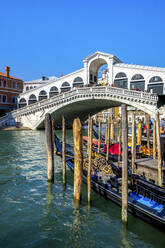 Italy, Veneto, Venice, Gondolas moored in front of Rialto Bridge - PUF01908