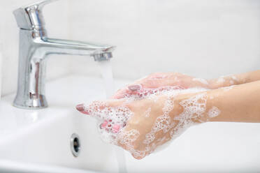 Close-Up Of Woman Washing Hands - EYF06533