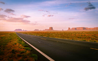 Road Amidst Field Against Sky During Sunset - EYF06780