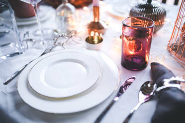 High Angle View of Empty Plates On Dining Table - EYF07012