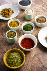 Bowls of assorted spices - GIOF08478