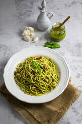 Spaghetti with pesto, walnut, basil and chilli and grana cheese - GIOF08499