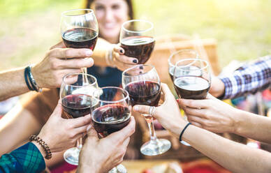 Cropped Hands Of Friends Toasting Wineglasses - EYF08242