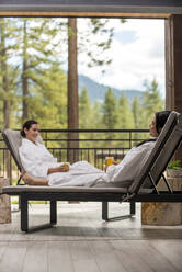 Two women relaxing at the Spa at Edgewood in Stateline, Nevada. - CAVF86062