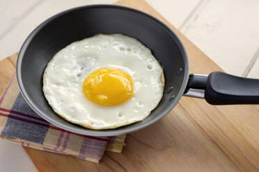 High Angle View Of Fried Egg In Frying Pan - EYF08476