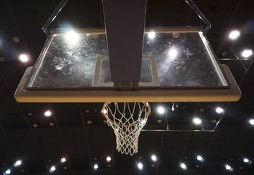 Low Angle View Of Basketball Hoop At Illuminated Stadium - EYF08671