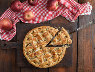 High Angle View Of Pie With Apples On Table - EYF08807