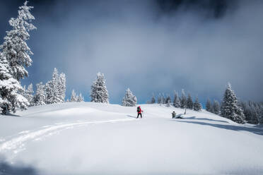 Senior man during ski tour, Inzell, Kienberg, Germany - HAMF00647