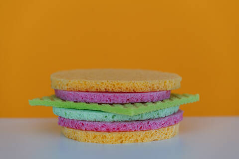 Cleaning sponges and sponge cloth in shape of a burger stock photo