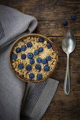Bowl of granola with blueberries and quinoa - LVF08949