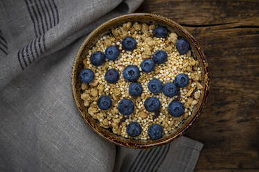 Bowl of granola with blueberries and quinoa - LVF08950