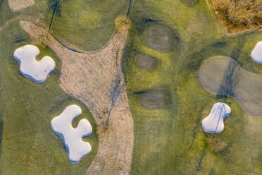 Germany, Bavaria, Wolfratshausen, Drone view of countryside golf course at dawn - LHF00798