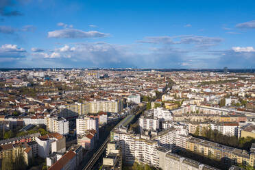 Germany, Berlin, Aerial view of Kottbusser Tor station and surrounding buildings - TAMF02388