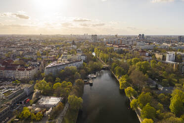 Germany, Berlin, Aerial view of Landwehr Canal at sunset - TAMF02391
