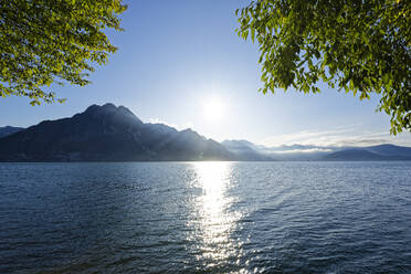 Italy, Lombardy, Riva di Solto, Lake Iseo and mountain - UMF00962